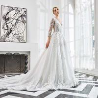 Winter Forest Long-sleeved v-neck lace applique beaded wedding dress ball gown
